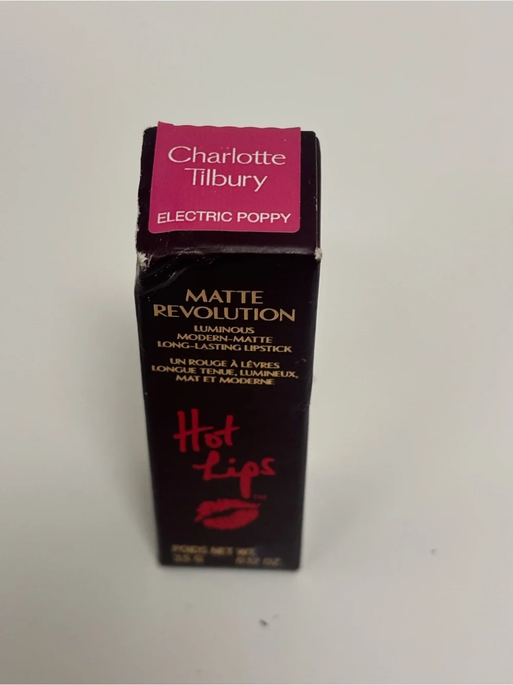 Charlotte Tilbury Matte Revolution Lipstick — Electric Poppy (Vibrant Pink)
